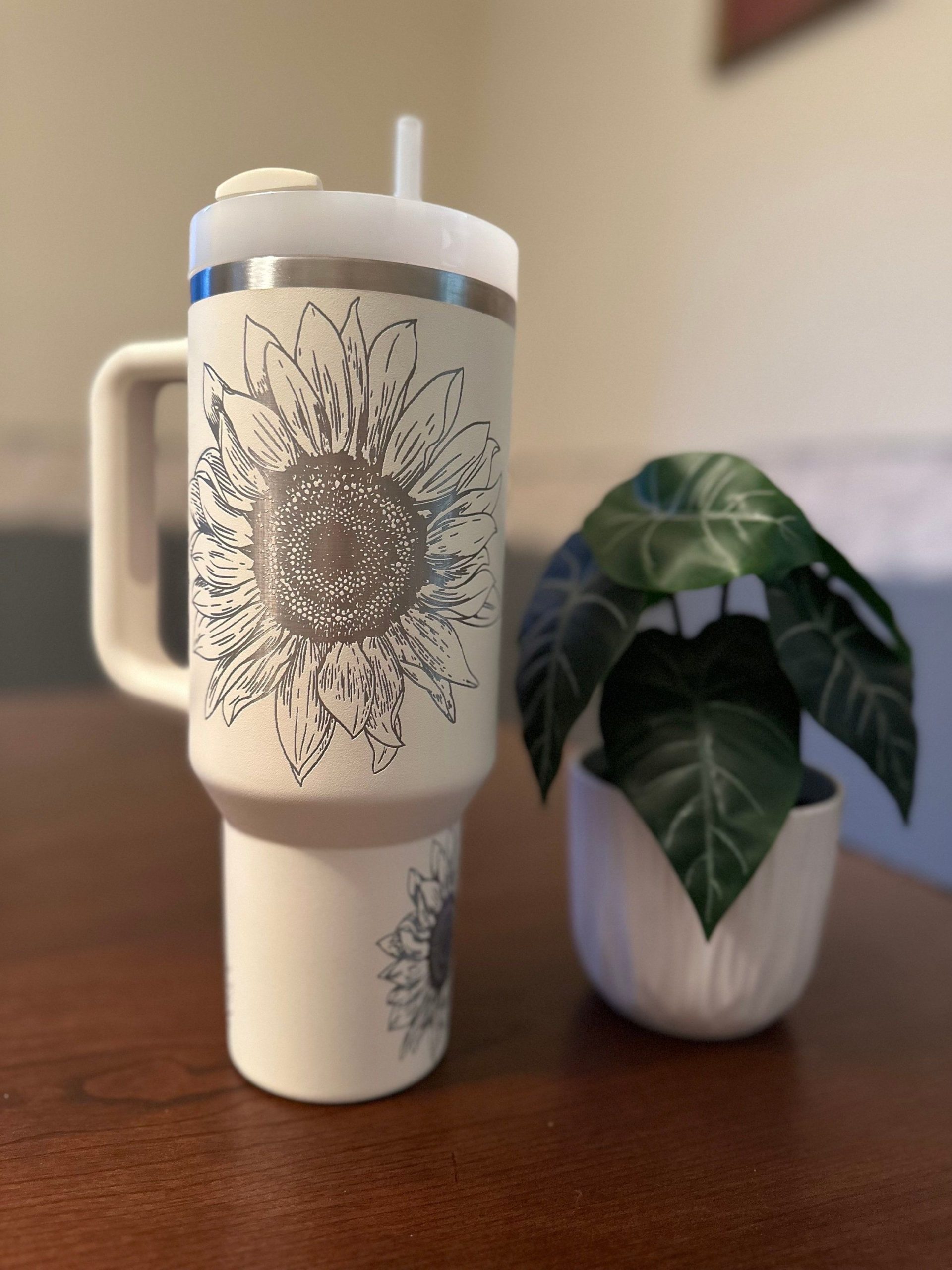 https://blainelux.com/wp-content/uploads/2023/08/Stanley-Tumbler-with-Sunflower-Engrave-scaled.jpg