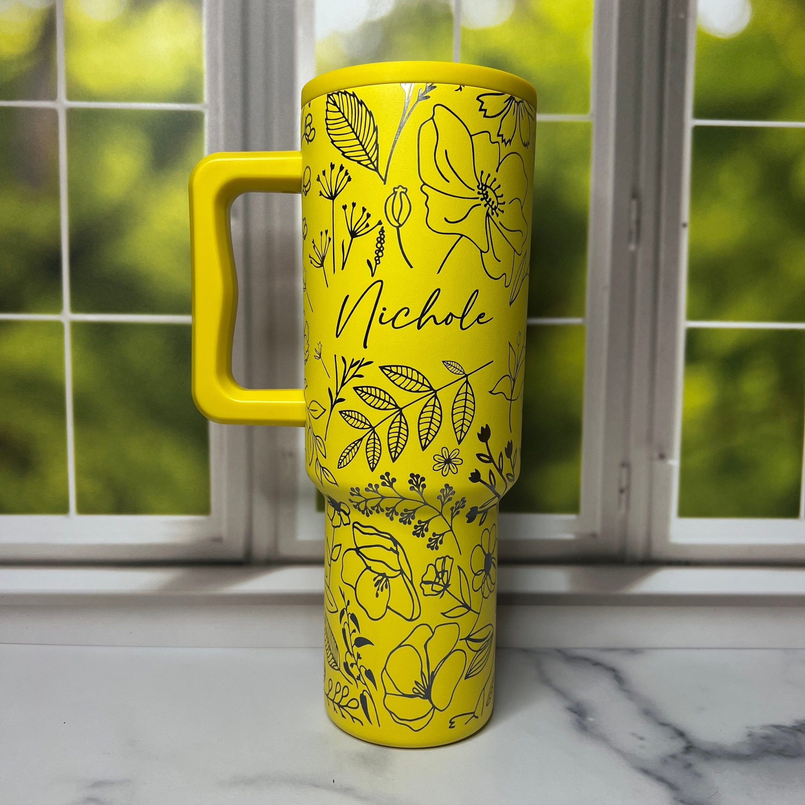 https://blainelux.com/wp-content/uploads/2023/12/40oz-Floral-Tumbler-with-personalized-name-scaled.jpg